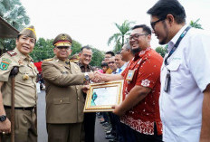 Plh Sekretaris Daerah (Sekda) Sumsel Edward Chandra Menghadiri Apel Bulanan K3 Nasional di Provinsi Sumsel