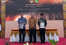 Fauzan Serahkan LHP dan LKPD Kabupaten Empat Lawang Tahun 2024