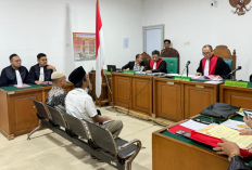 Peta Desa Bawa Dua Terdakwa ke Pengadilan