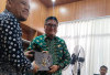 Sertijab Plt Kepala Bapenda Kabupaten Lahat Berlangsung Khidmat
