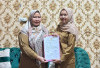 Delianah PJ Kades Tanjung Telang Merbar Resmi Akhiri Masa Jabatan, Digantikan Sekdes