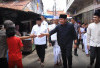 Herman Deru Serahkan Bantuan Hewan Qurban kepada Masyarakat 