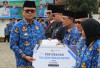 Upacara HUT Korpri di Empat Lawang Berlangsung Khidmat, Bupati Serahkan Tali Asih kepada ASN Purna Bakti